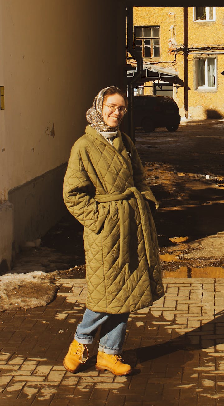 a woman wearing a quilted coat