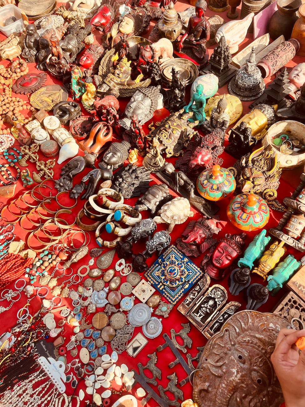 vintage jewelry and accessories on table on market