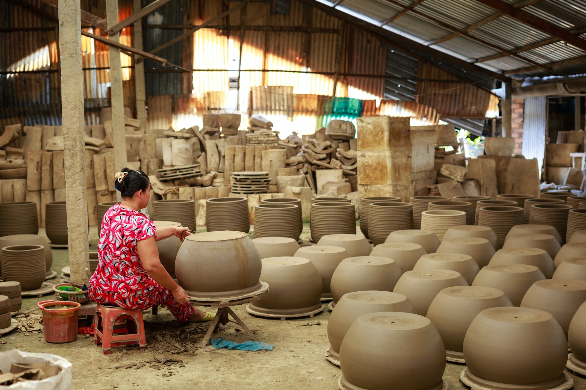 woman making pots