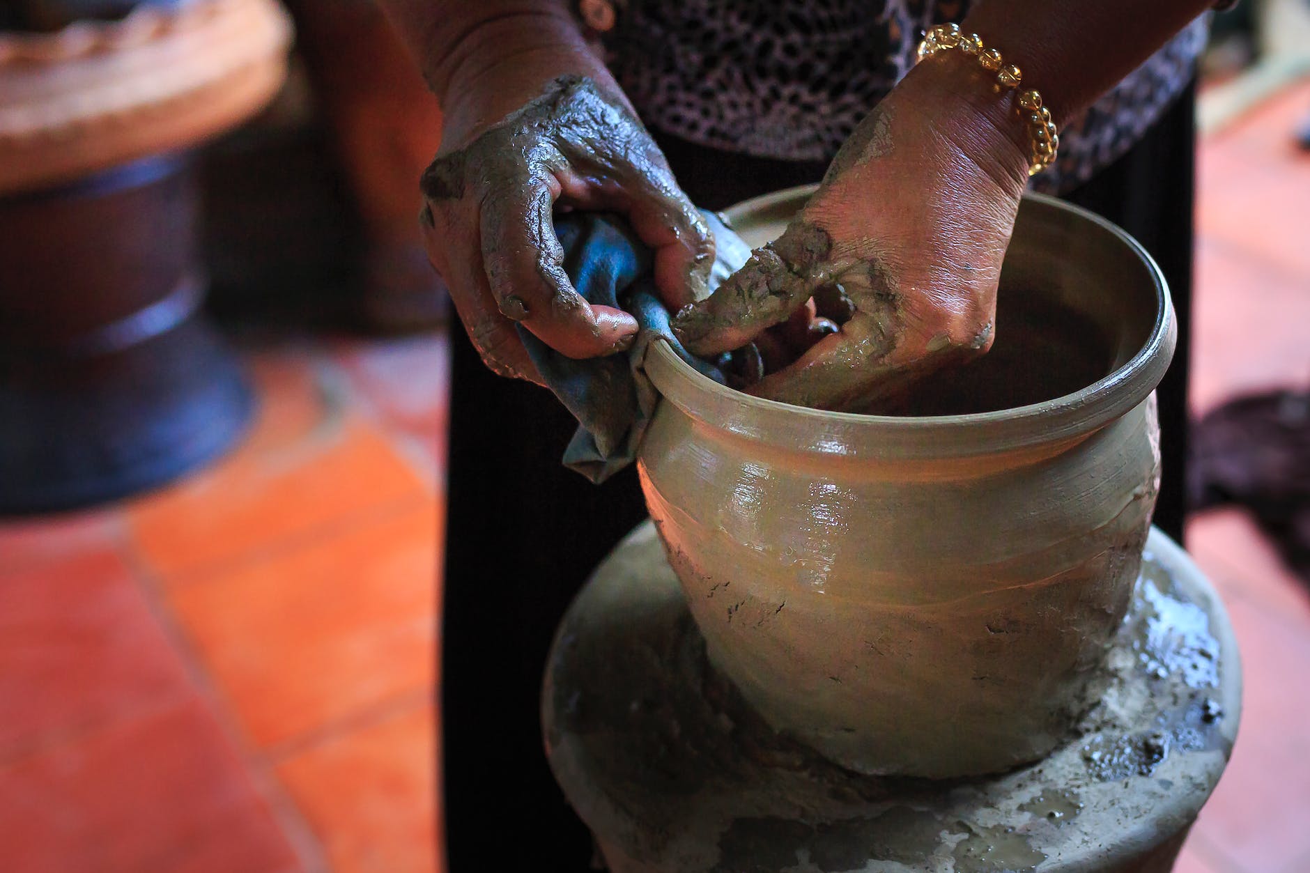 person molding pot