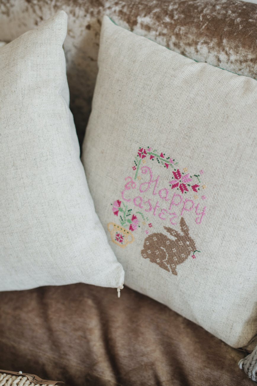 pair of linen decorative pillows with easter pattern