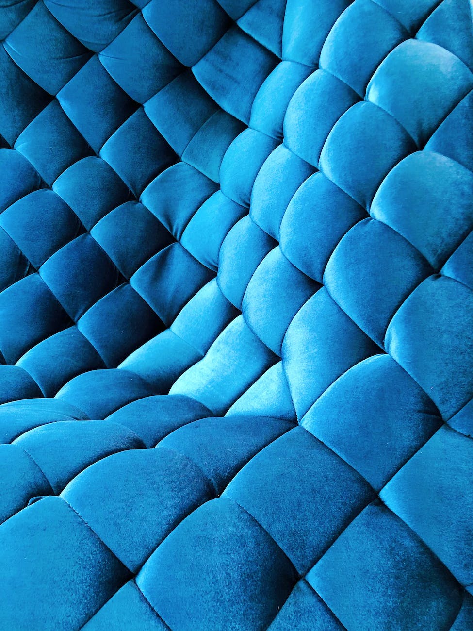 close up of blue quilted velvet
