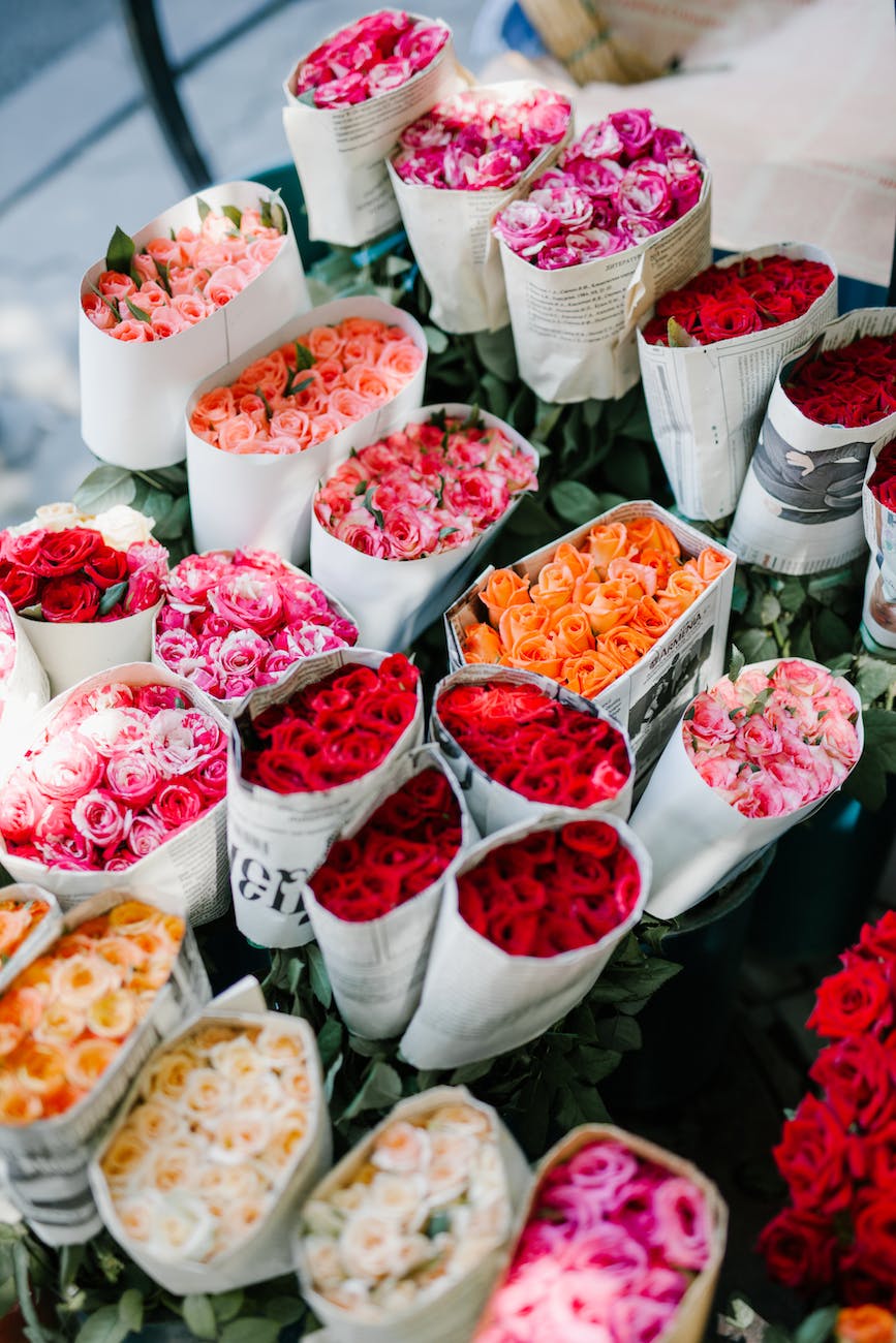 assorted bunches of roses in flower market