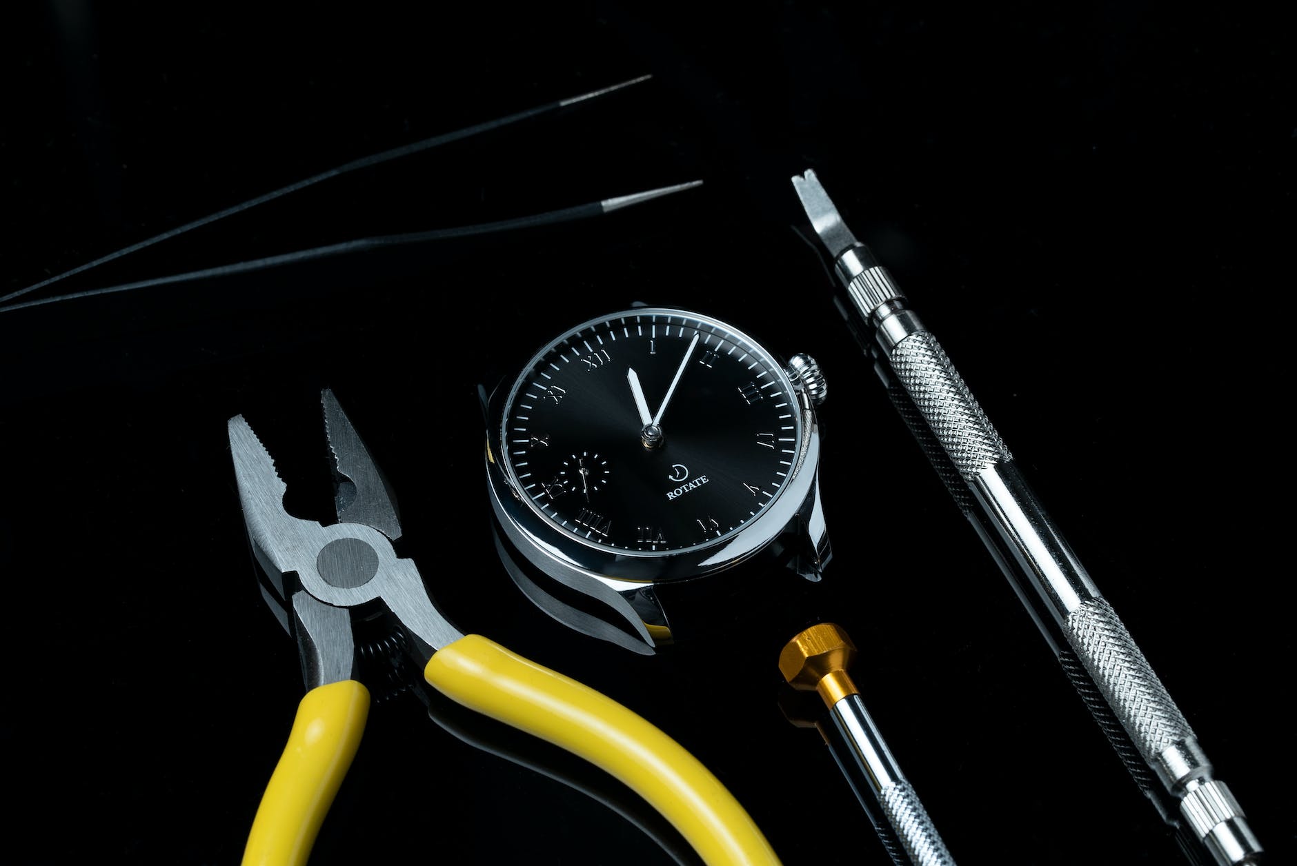 flat lay photo of tools of watchmaking