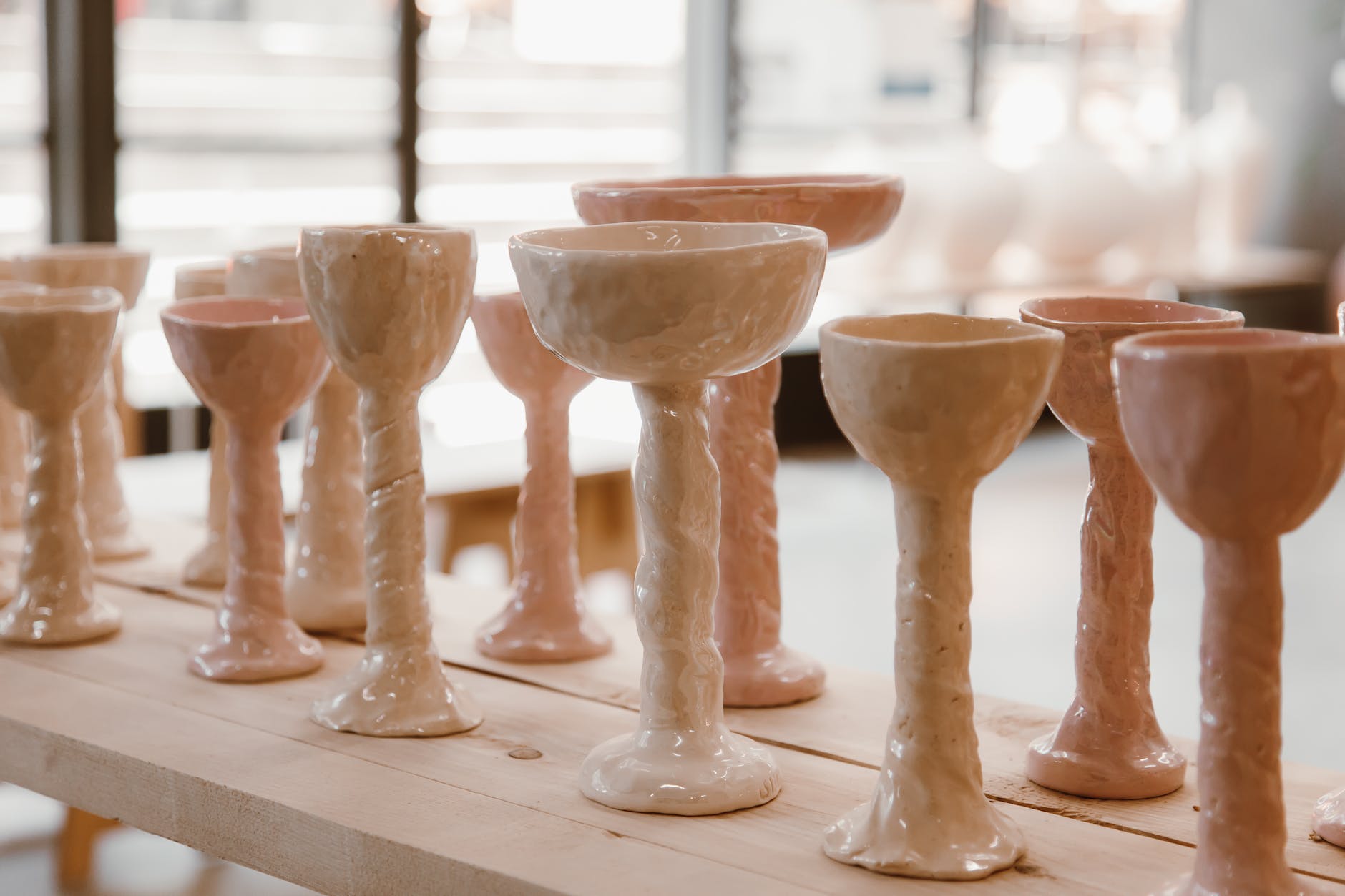 rows of glazed clay chalices
