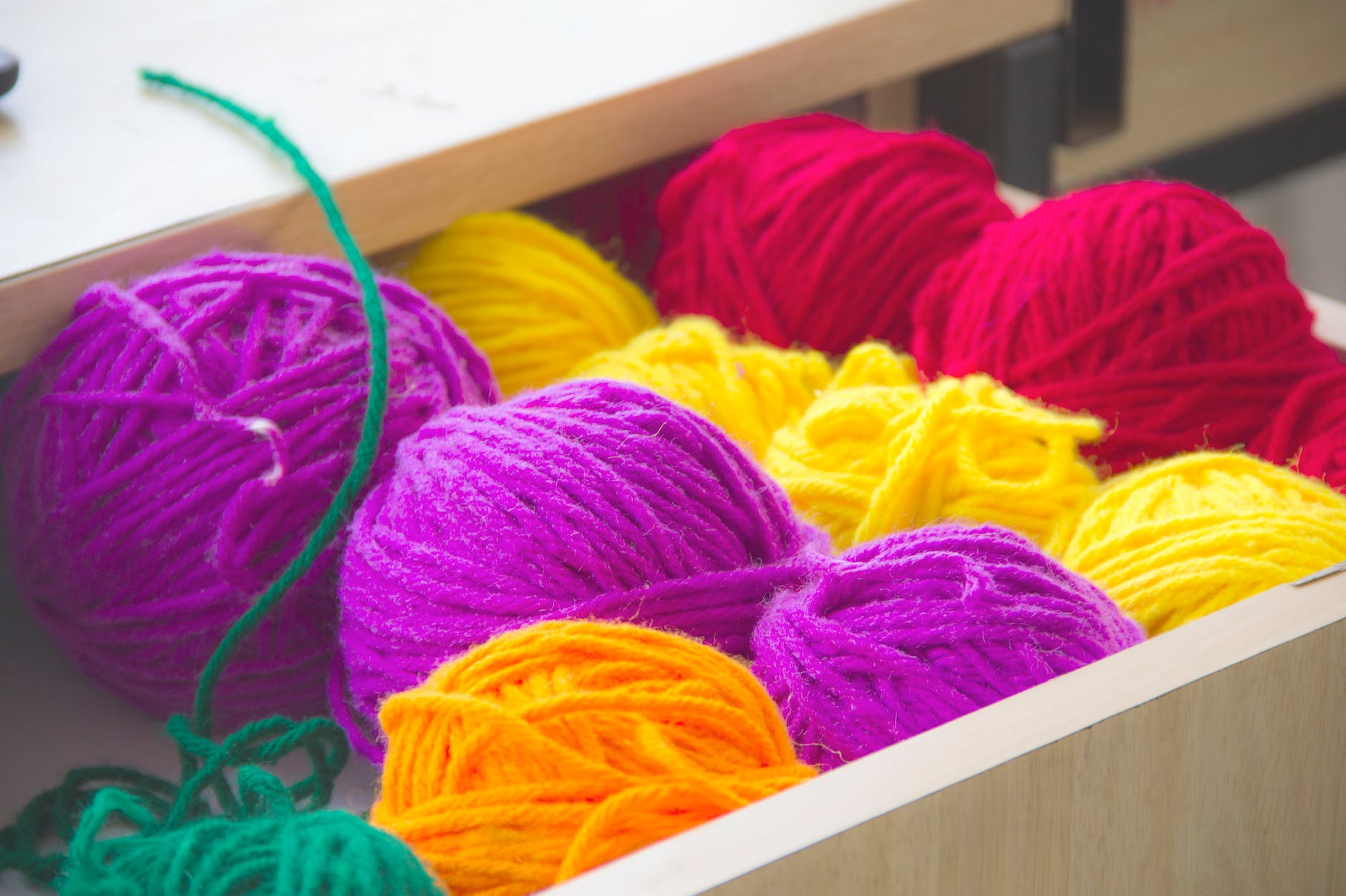 close up photography of colorful yarns